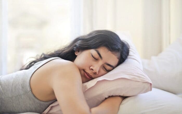 Urinary Tract Infections can be tiring, as the tired woman in the picture shows.